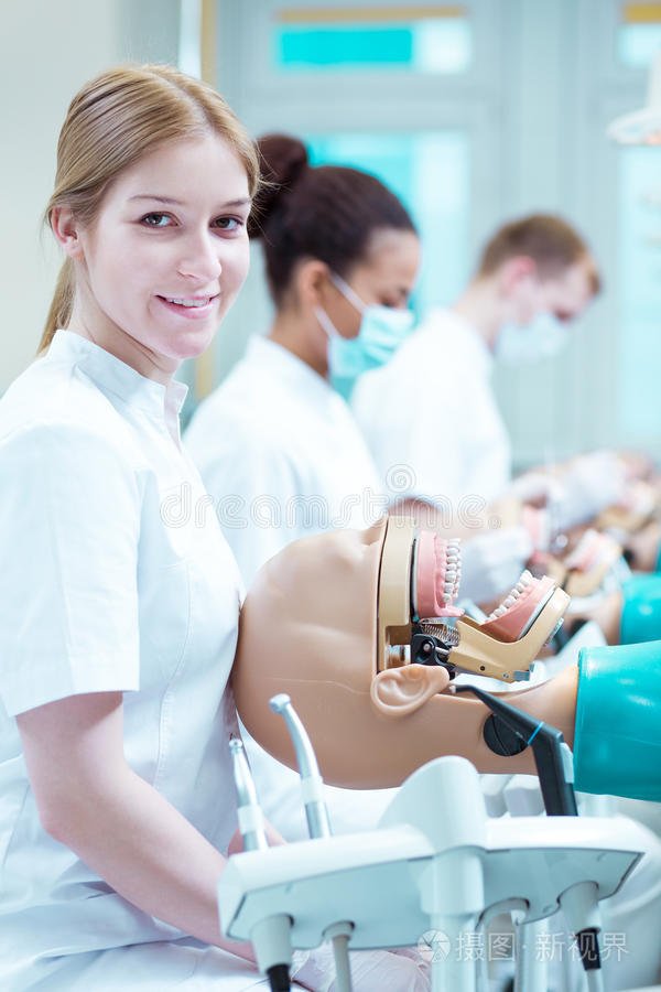 students practice dentistry skill via the phantom head